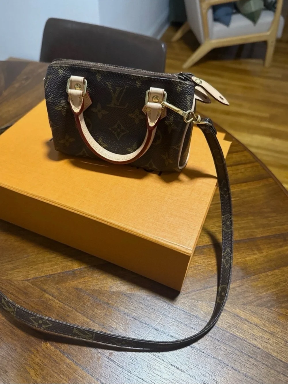 Louis Vuitton Monogram Mini Speedy Bandoulière in Brown with Natural Vachetta